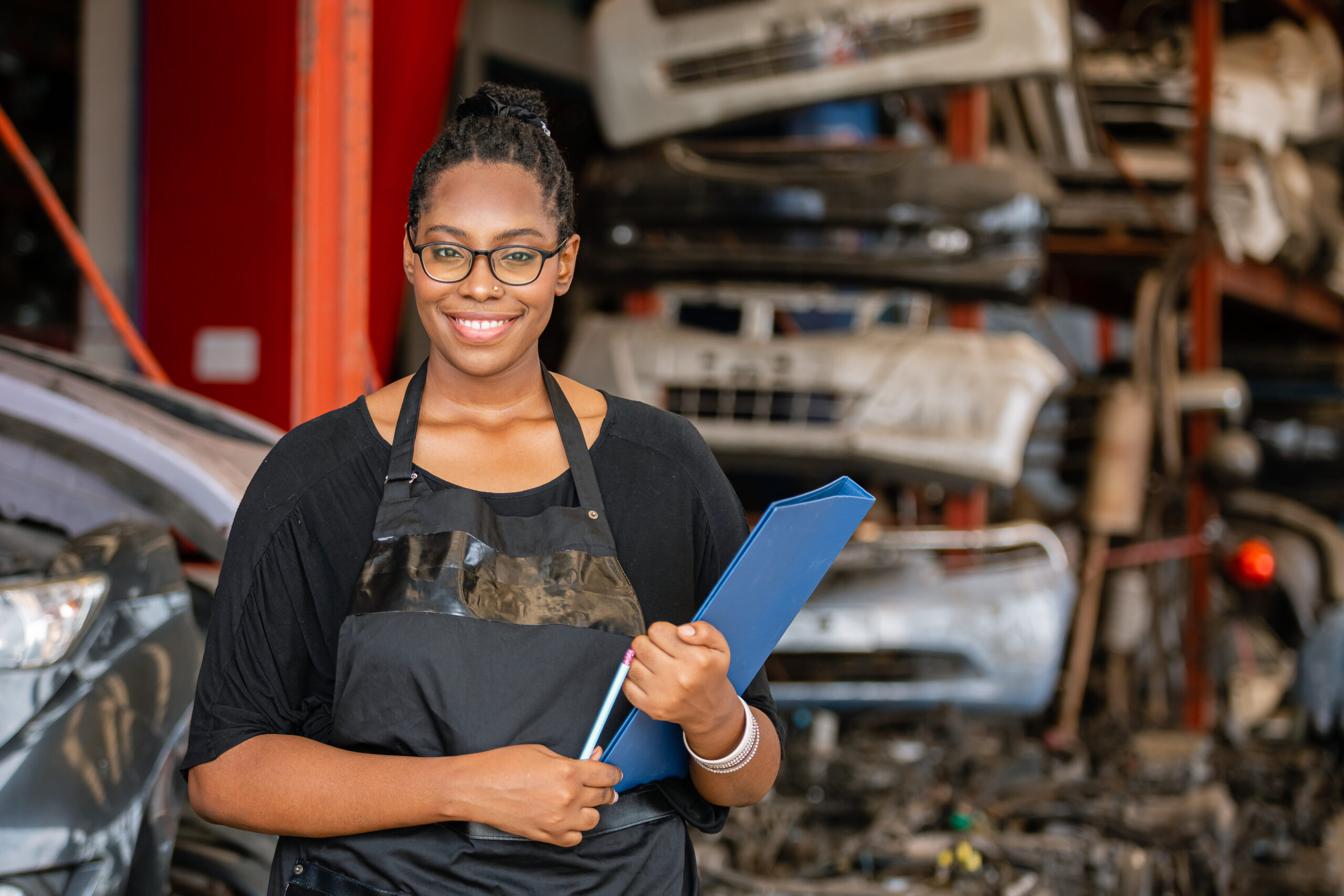 African american worker woman wear spectacles crossed arms holdi